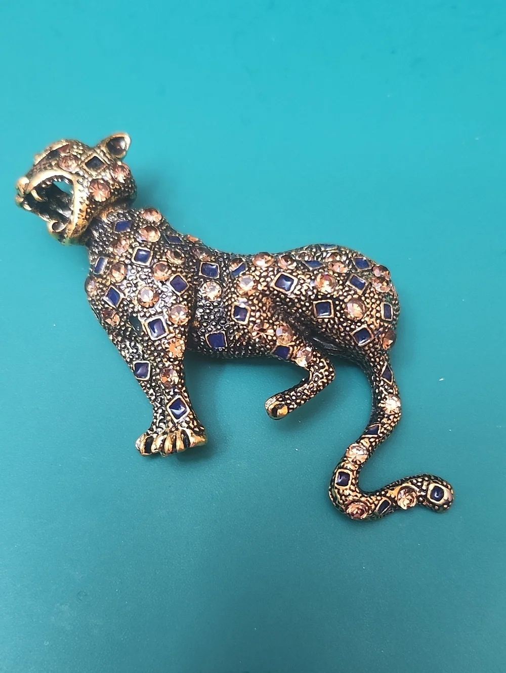 Gold-Tone Leopard Brooch with Blue and Pink Accents